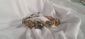 Pulsera Esencia Dorada y lila