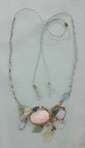 Collar bosque y playa