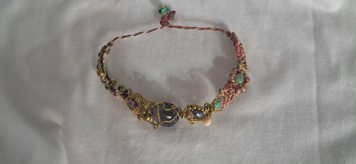 Pulsera Esencia Dorada y lila